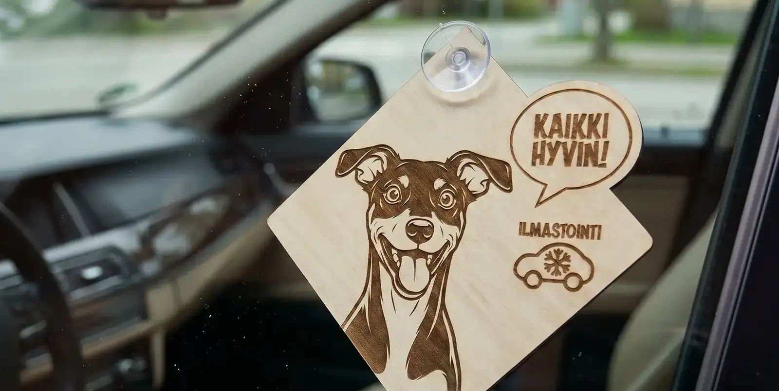 5 tapaa kertoa ohikulkijoille, että koirallasi on hyvä olla autossa