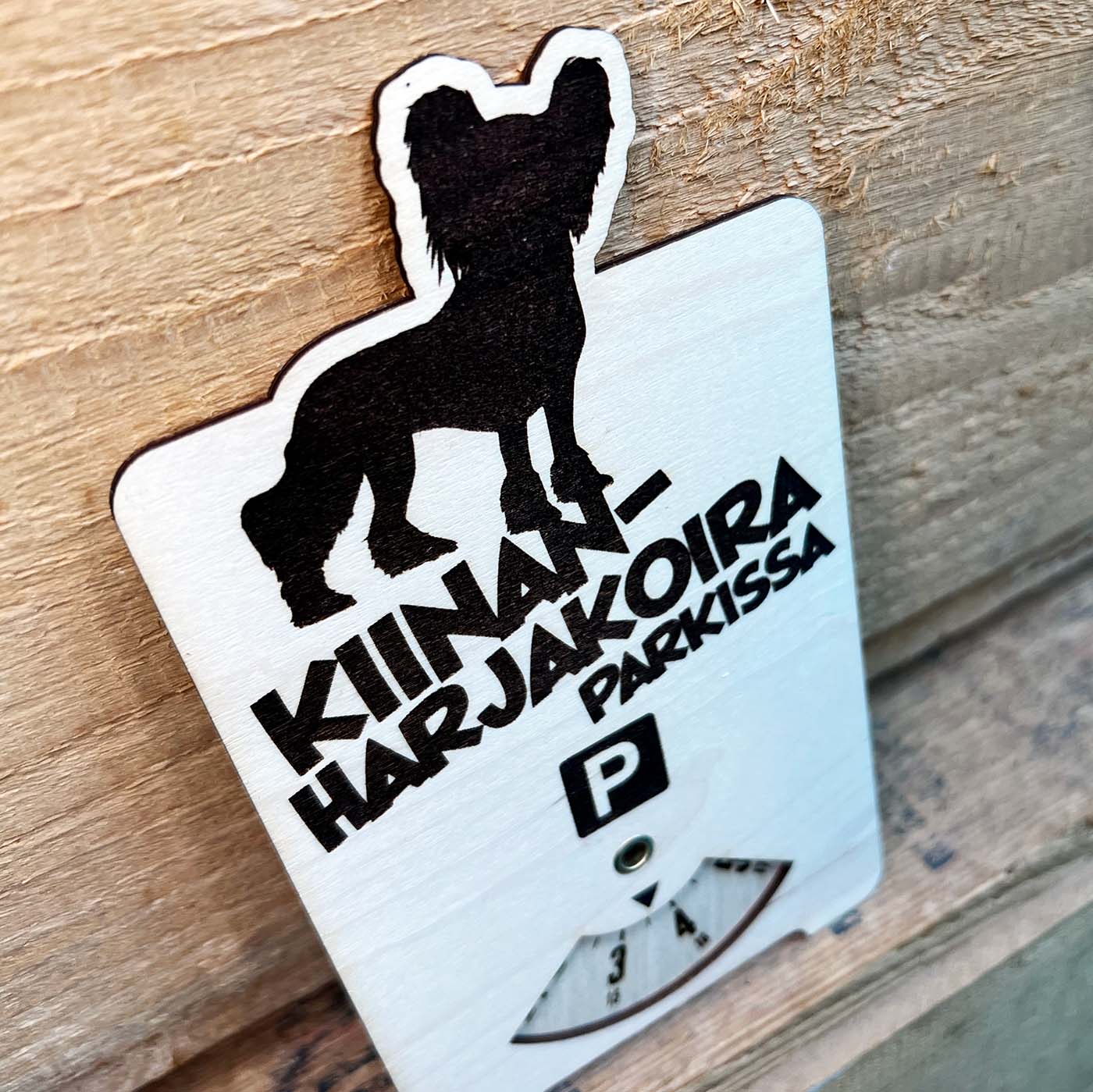 Kiinanharjakoira parkkikiekko