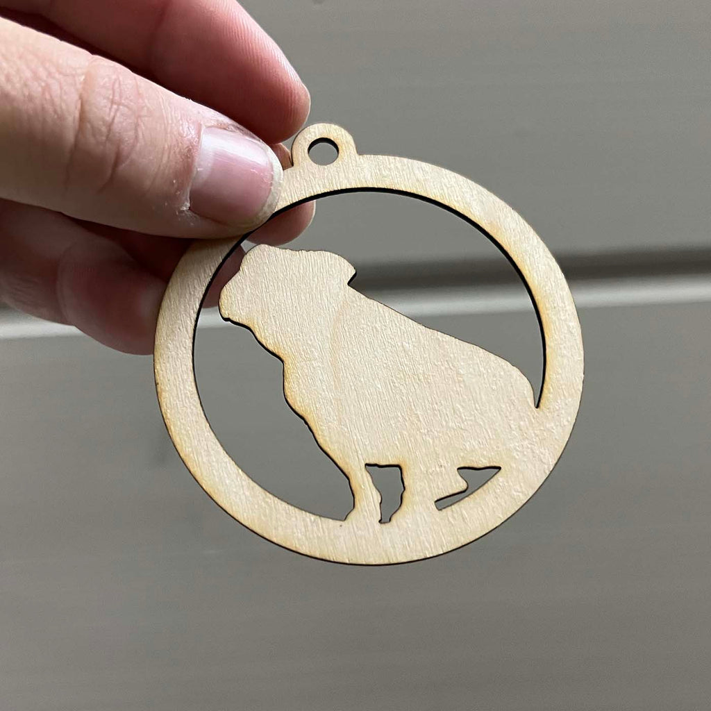 Joulukoriste kuuseen koiran kuvalla