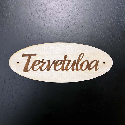 Tervetuloa kyltti oveen