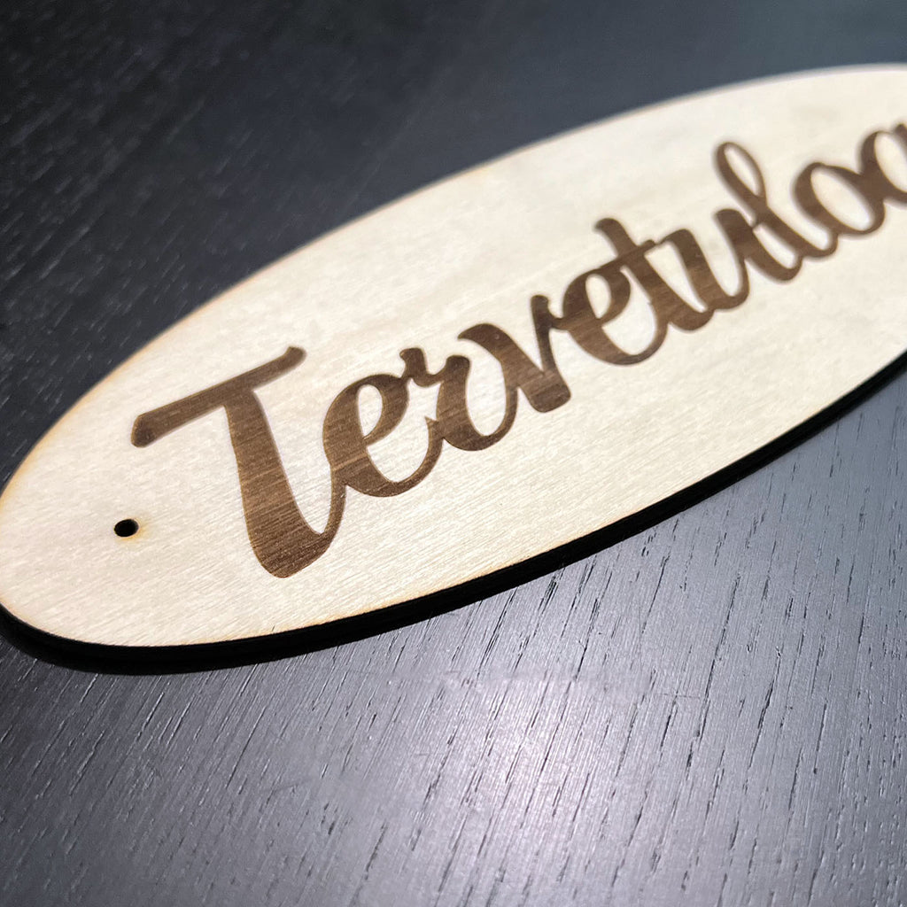 Tervetuloa kyltti oveen